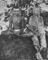 photographof_ramana_with_mother_Alagammal_1913.gif