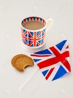 20673438-A-cup-of-milky-english-tea-in-a-br....jpg